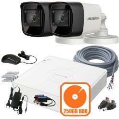 Hikvision biztonsági kamerarendszer kiegészítőkkel és rögzítővel.